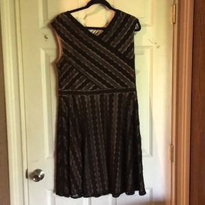 Sleeveless cream w/ black lace. Knee length